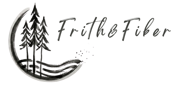 A black and white logo featuring a hand-painted style illustration of pine trees inside a crescent moon and wave, next to the cursive text 'Frith&Fiber' on a solid white background.